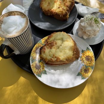 Les Pascals - Croque monsieur on the top, Croissant with ham and cheese at the bottom, Meringue on the right - Bakeries Near Me - Glen Ellen, California Les Pascals - Croque monsieur on the top, Croissant with ham and cheese at the bottom, Meringue on the right - Bakeries Near Me - Glen Ellen, California