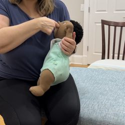 Atlanta Lactation - Katherine demonstrating nipple positioning to achieve a proper latch.