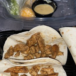 Chicken Taco's to go that were yummy - they seasoned the meat very well (3 tacos) Chicken Taco's to go that were yummy - they seasoned the meat very well (3 tacos)