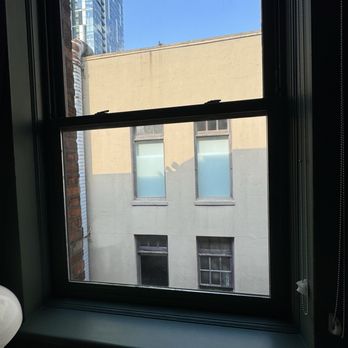 Palihotel Seattle - Window that was painted open and not fully closed. - Hotels Near Me - Seattle, Washington Palihotel Seattle - Window that was painted open and not fully closed. - Hotels Near Me - Seattle, Washington
