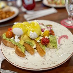 Traditions at Reunion Resort - Avocado toast with eggs Benedict