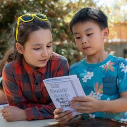 Friends Western School - Reading buddies! 5th grader with 2nd grader