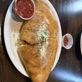 Milano Italian Restaurant - Meat lovers Calzone - Italian Near Me - Georgetown, Kentucky Milano Italian Restaurant - Meat lovers Calzone - Italian Near Me - Georgetown, Kentucky