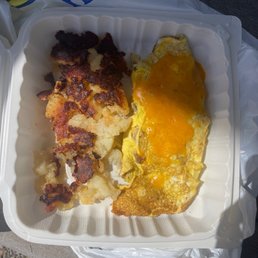 Bacon omelette with cheddar... home fries