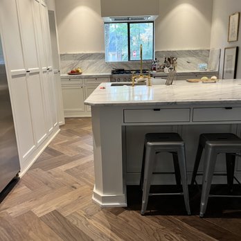 All Floors & More - a kitchen with a center island - Flooring Near Me - Magnolia, Texas