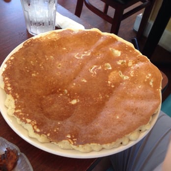The Original Egg - Single Colossal Pancake. It the same size as the dinner plate. - Breakfast & Brunch Near Me - Sarasota, Florida The Original Egg - Single Colossal Pancake. It the same size as the dinner plate. - Breakfast & Brunch Near Me - Sarasota, Florida
