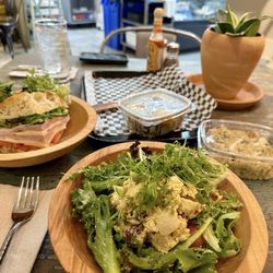 Walter’s Cafe - Greens from local farms tossed in the most delicious housemade vinaigrette. Curry chicken salad is perfectly seasoned & not overpowering.