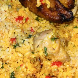 Tropical Gourmet - Arroz con Pollo with a side of Amarillos