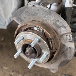 David's Auto and Transport - New wheel studs and lug nuts along with a head light restoration