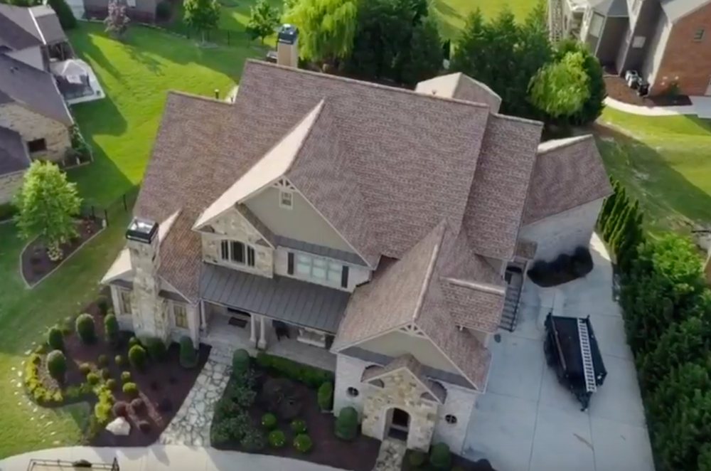 Slide of Champion Roofing