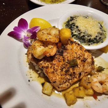 Grill 584 - Cajun Salmon w/Basmati Rice and creamed spinach. - Steakhouses Near Me - Burlington, North Carolina Grill 584 - Cajun Salmon w/Basmati Rice and creamed spinach. - Steakhouses Near Me - Burlington, North Carolina
