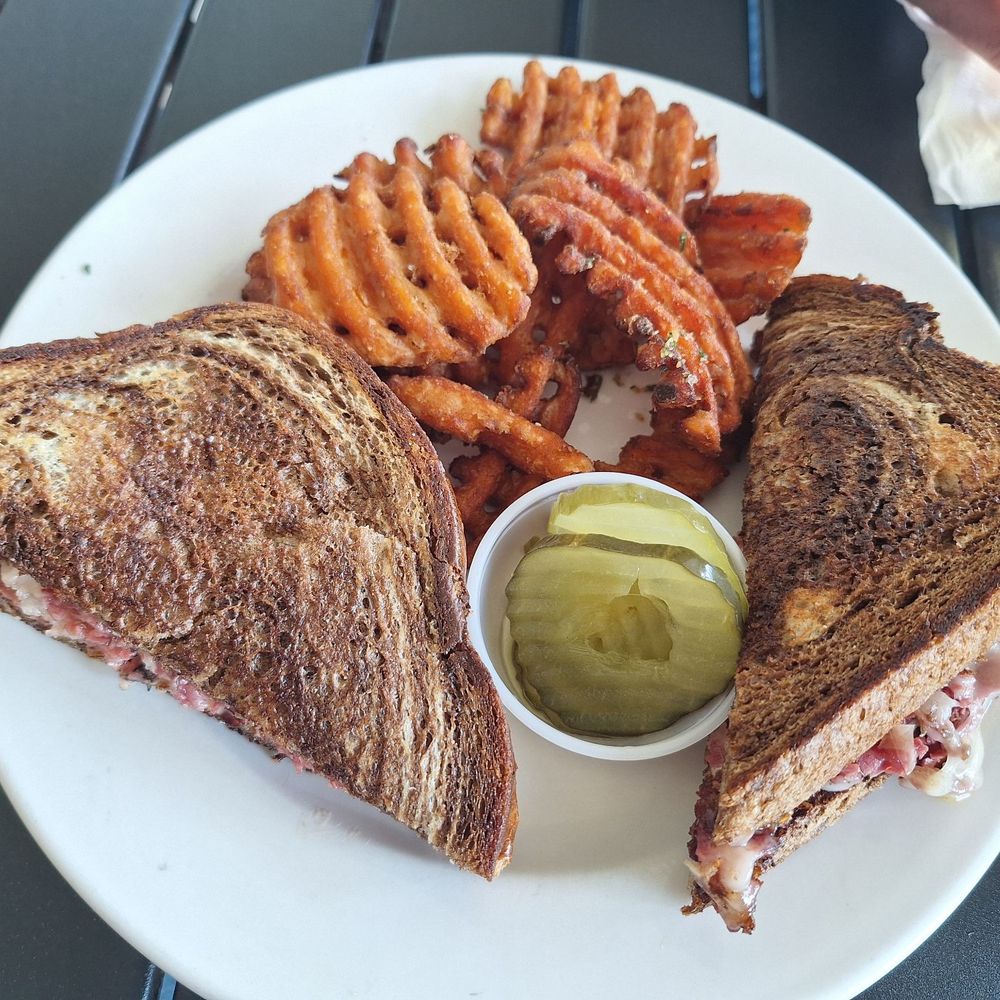 The Cove Restaurant - Reuben sandwich with sweet potato waffle fries - New American Near Me - Long Beach, Washington The Cove Restaurant - Reuben sandwich with sweet potato waffle fries - New American Near Me - Long Beach, Washington
