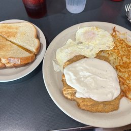 Chicken Fried Steak, Over Easy Eggs, Hasbrowns and Toast. Chicken Fried Steak, Over Easy Eggs, Hasbrowns and Toast.