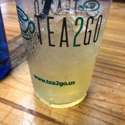 Half full iced green tea