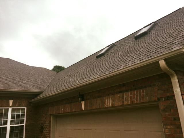 Slide of Up & Over Roofing