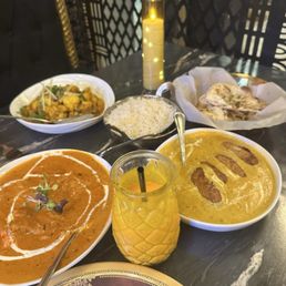 Butter chicken, gobi musallam, lababdar malai kofta, garlic naan. Butter chicken, gobi musallam, lababdar malai kofta, garlic naan.