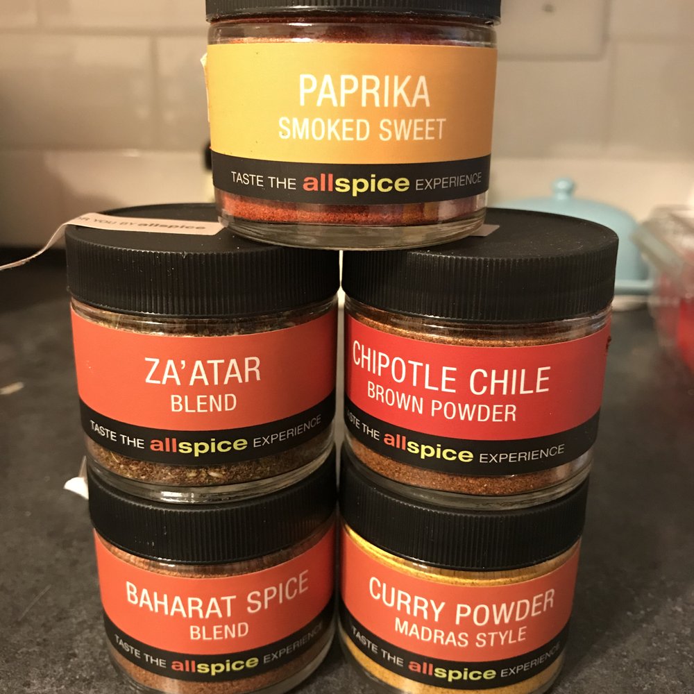 AllSpice - three jars of spices on a counter - Herbs & Spices Near Me - Des Moines, Iowa