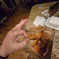 Domino's Pizza - Terrible. This Dominos is apparently selling the world's smallest wings.
