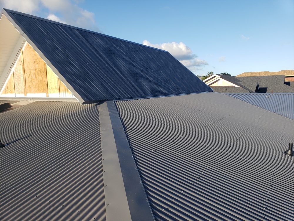 Slide of Metal Roof Pros-Kaua'i Roof Installers