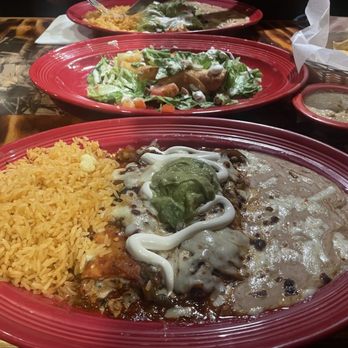 Salsa & Beer - Spicy Molcajete Enchiladas w/ chicken (front), Potato Taquitos (middle), Spicy Green Enchiladas (back) - Mexican Near Me - North Hollywood, California Salsa & Beer - Spicy Molcajete Enchiladas w/ chicken (front), Potato Taquitos (middle), Spicy Green Enchiladas (back) - Mexican Near Me - North Hollywood, California