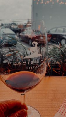 Photo of Glacier View Cellars - Woodinville, WA, US. a hand holding a wine glass