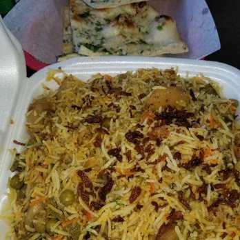 Nawabs Kebabs - Veggie Biyrani and garlic naan - Indian Near Me - Charlotte, North Carolina Nawabs Kebabs - Veggie Biyrani and garlic naan - Indian Near Me - Charlotte, North Carolina