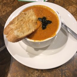 Tomato bisque soup with bread