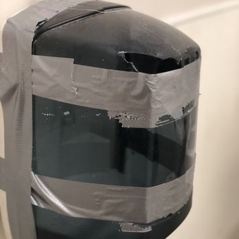 CVS Pharmacy - a black and white helmet on a wall - Drugstores Near Me - Norcross, Georgia