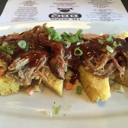 Mini Q appetizer. Pulled pork over some slaw over cornbread. Mini Q appetizer. Pulled pork over some slaw over cornbread.