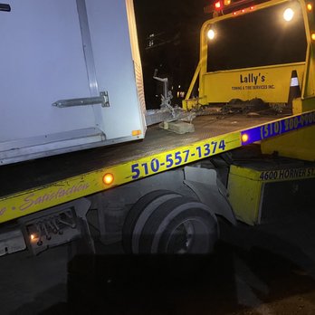 A9 Towing - Utilizing wood to slide trailer forward - Towing Near Me - San Lorenzo, California A9 Towing - Utilizing wood to slide trailer forward - Towing Near Me - San Lorenzo, California