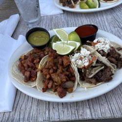Left 2: pastor tacos Right: 2 carne asada tacos