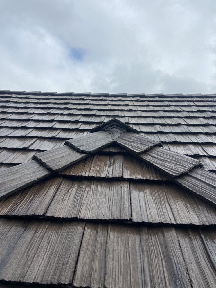 Slide of Green Shield Roofing
