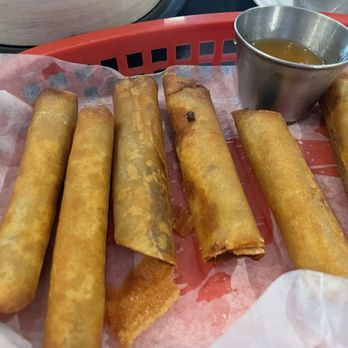 Kapwa Bakery & Cafe - Yummy Beef Eggrolls. It's 10 pieces but the family couldn't wait for the picture. It's their signature item. - Bakeries Near Me - Niles, Illinois