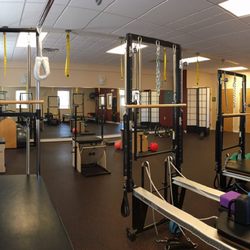 Symmetry Pilates Center - Our studio is full of equipment with highly trained instructors to help you achieve your goals.