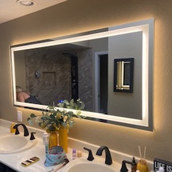 Jaime Handyman - The new mirror installed and powered up with defrost and 3 color options available when powered on - Plumbing Near Me