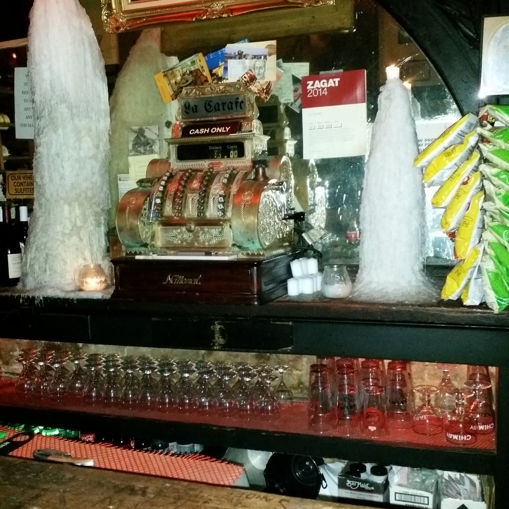 La Carafe - The cash register. And it still works. Great nostalgic bar in downtown Houston. - Wine Bars Near Me - Houston, Texas La Carafe - The cash register. And it still works. Great nostalgic bar in downtown Houston. - Wine Bars Near Me - Houston, Texas