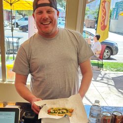 RoRo Dogs - Happy with a Chicago Dog.