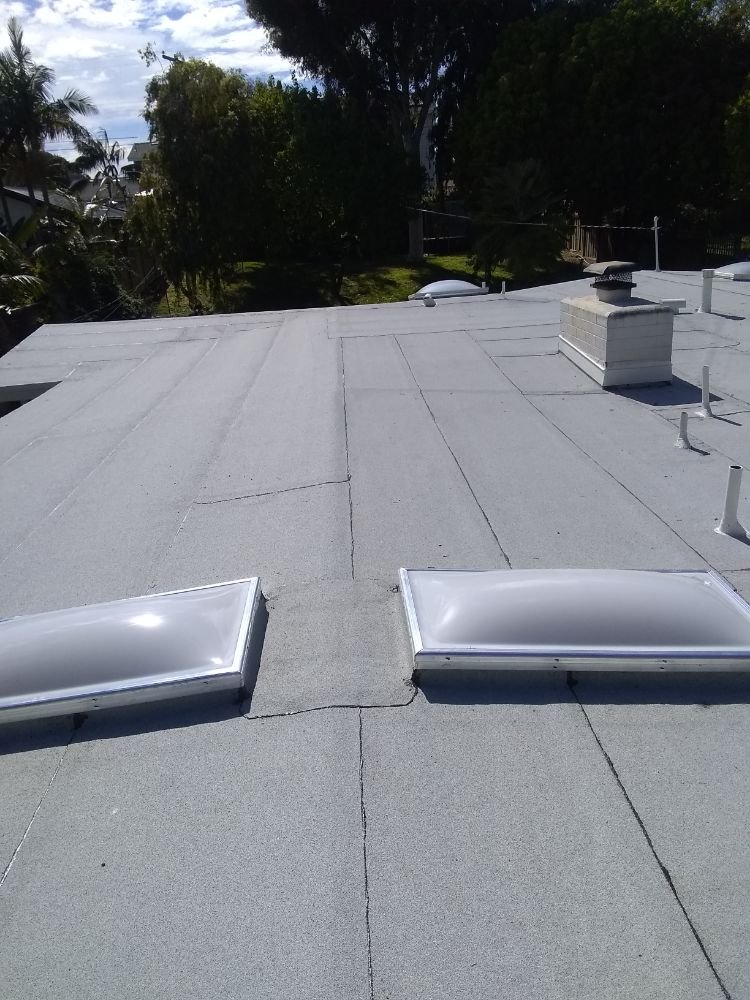 Slide of Tello's Roofing