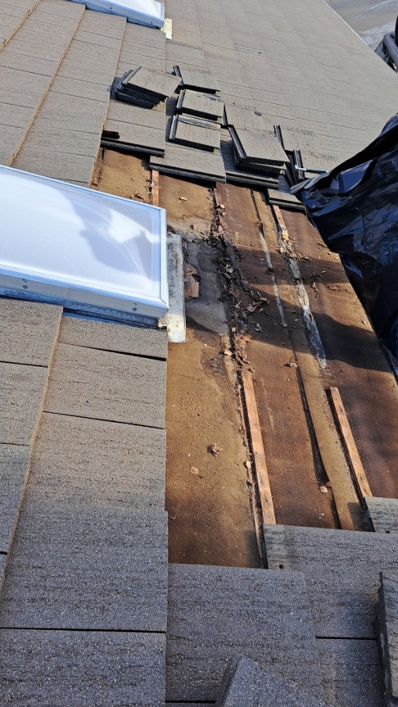 Slide of Eleazars Roofing