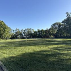 Riddleview Park - Flat grassy area with "soccer field" and "baseball field" in the back