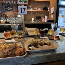 Sage fries, chicken tenders, fried pickles, and 3 of their flights.