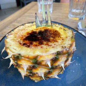 Tikis Grill & Bar - Pineapple crème brûlée - Seafood Near Me - Honolulu, Hawaii Tikis Grill & Bar - Pineapple crème brûlée - Seafood Near Me - Honolulu, Hawaii