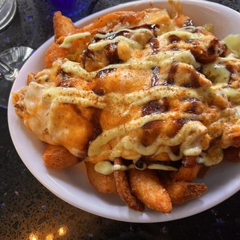 Poor Calvin's - Crab Fries - Asian Fusion Near Me - Atlanta, Georgia Poor Calvin's - Crab Fries - Asian Fusion Near Me - Atlanta, Georgia