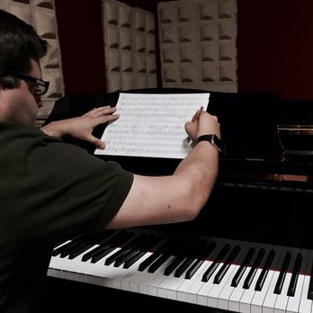 Yalil Guerra - Professor Guerra composing new music - Musical Instruments & Teachers Near Me Yalil Guerra - Professor Guerra composing new music - Musical Instruments & Teachers Near Me