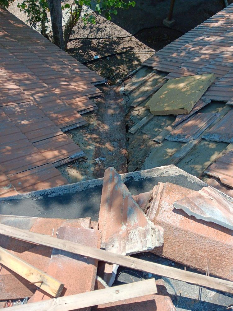 Slide of Rubio R Roofing