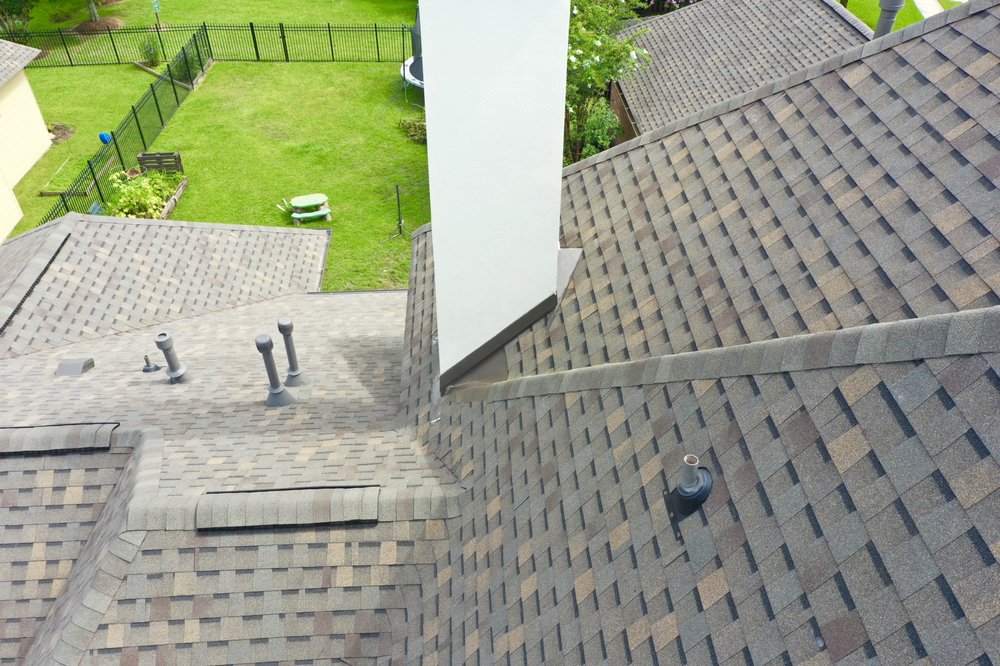 Slide of Pinnacle Exteriors Roofing