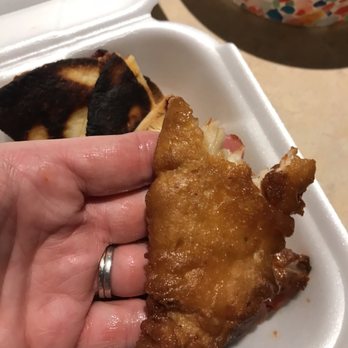 Chili's - Burnt brisket quesadilla and super greasy Original Chicken Crisper. Look at how greasy my hand is - American Near Me - Bastrop, Texas