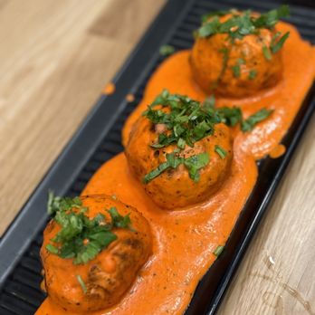 JaxSpice At St Johns - three meatballs covered in tomato sauce - Indian Near Me - Saint Johns, Florida