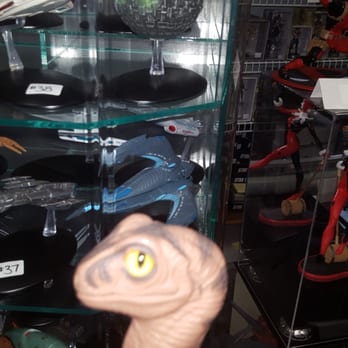 Sports 'n' More - Bob the Raptor Says "The Statues here are really cool." - Comic Books Near Me - Mentor, Ohio Sports 'n' More - Bob the Raptor Says "The Statues here are really cool." - Comic Books Near Me - Mentor, Ohio
