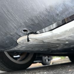 Mavis Tires & Brakes - Ziptied skid plate (missing screws)